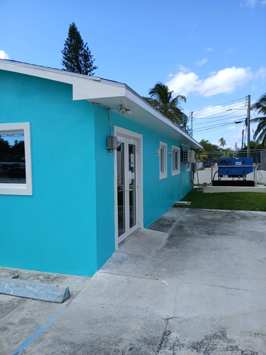 Turquoise commercial building freshly painted